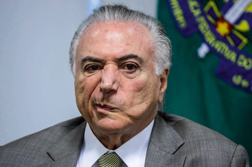 Brazil's President Michel Temer, reacts during a meeting for announcement of resources for expansion and modernisation of Brasilia subway, in Brasilia, Brazil January 22, 2018. REUTERS/Ueslei Marcelino